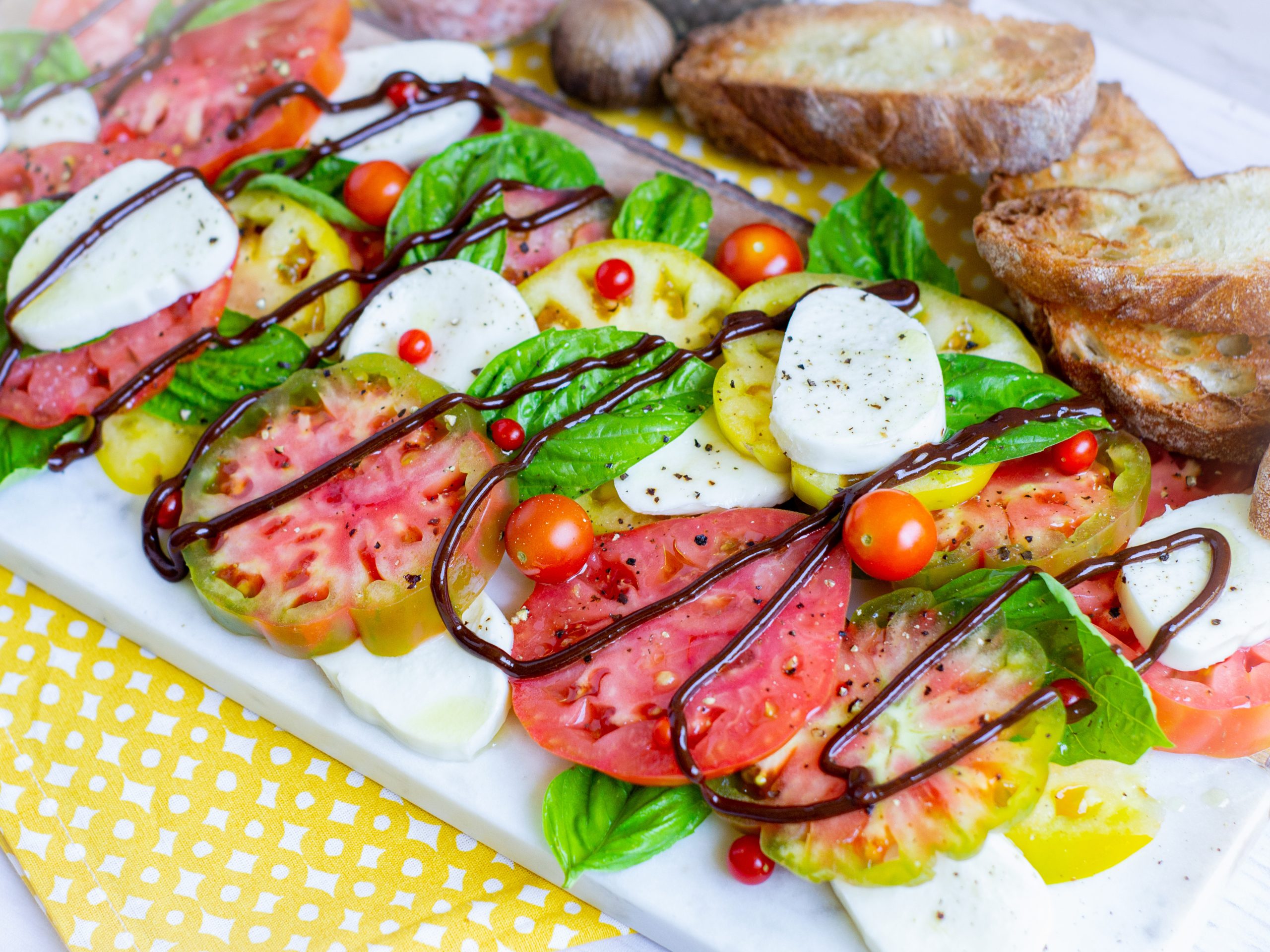 Black Garlic Drizzled Caprese Salad GradFood