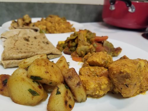 Coconut Curry Chicken with Spiced Potatoes and Roti
