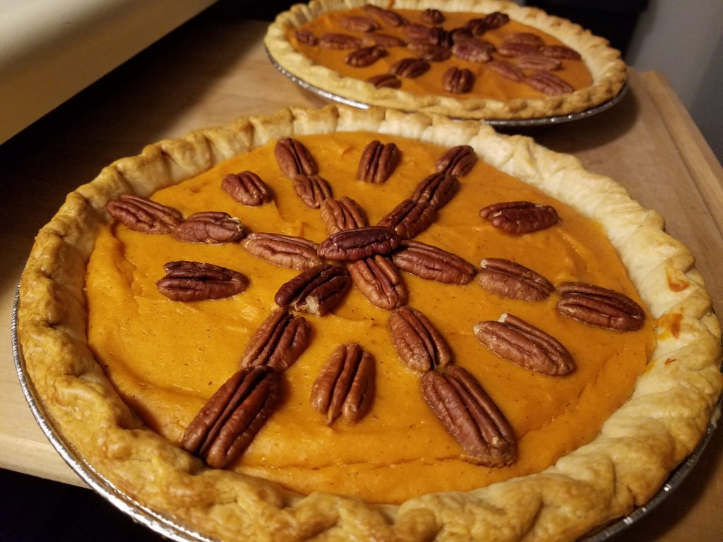 Silky Sweet Potato Pie Topped with Pecans