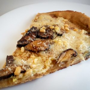 White Garlic Mushroom Pizza with Roasted Pine Nuts