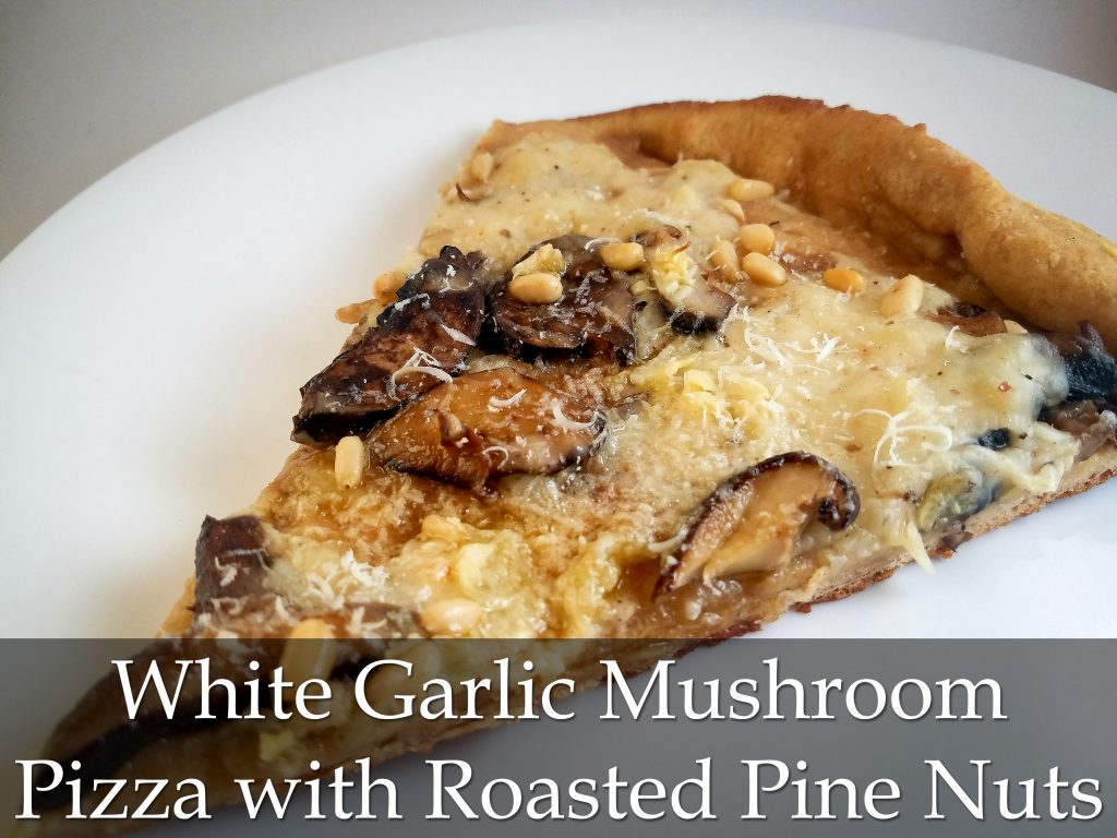 White Garlic Mushroom Pizza with Roasted Pine Nuts