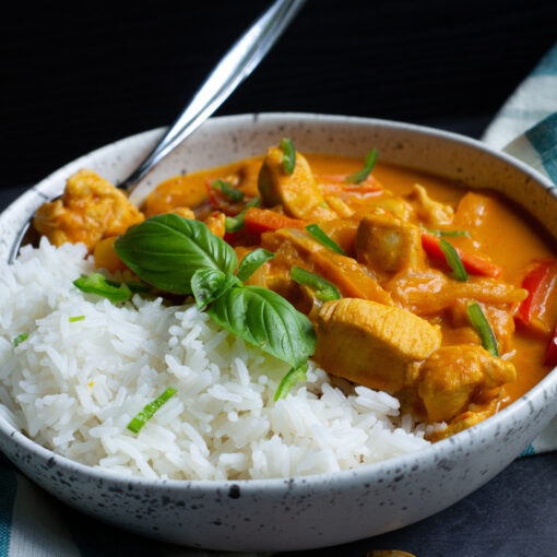 Thai-Style Chicken Pumpkin Curry in a bowl with rice