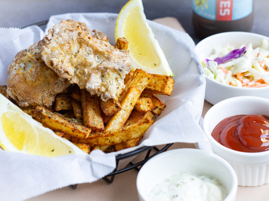 Air Fryer Beer Battered Fish & Chips served with ketchup, tartar sauce, and coleslaw
