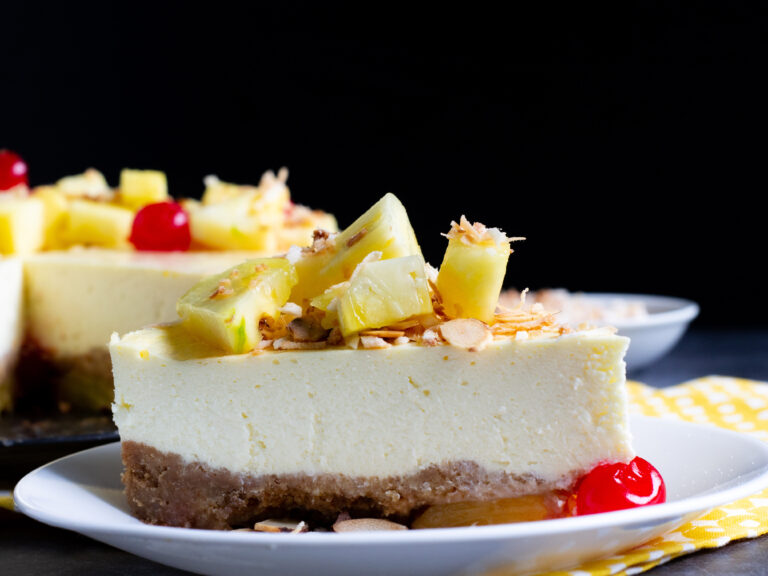 Up close slice of a Pineapple Coconut Cheesecake
